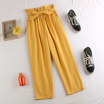 Női nadrág szalaggal, magas derékkal