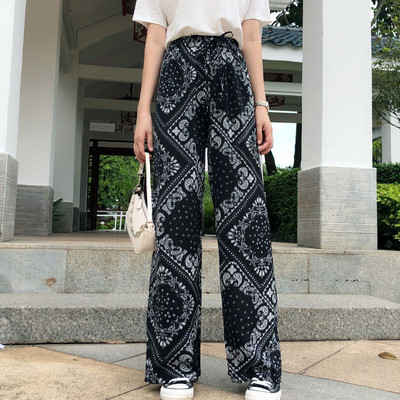 Női nadrág magas elasztikus derékkal és megkötővel