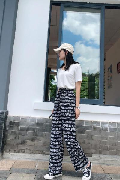 Női nadrág magas elasztikus derékkal és megkötővel