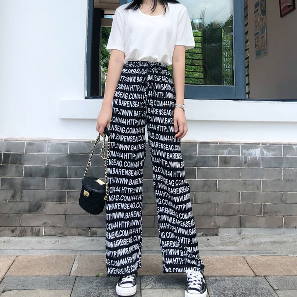 Női nadrág magas elasztikus derékkal és megkötővel