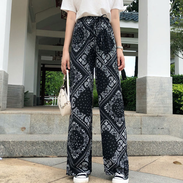 Női nadrág magas elasztikus derékkal és megkötővel