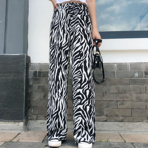 Női nadrág magas elasztikus derékkal és megkötővel