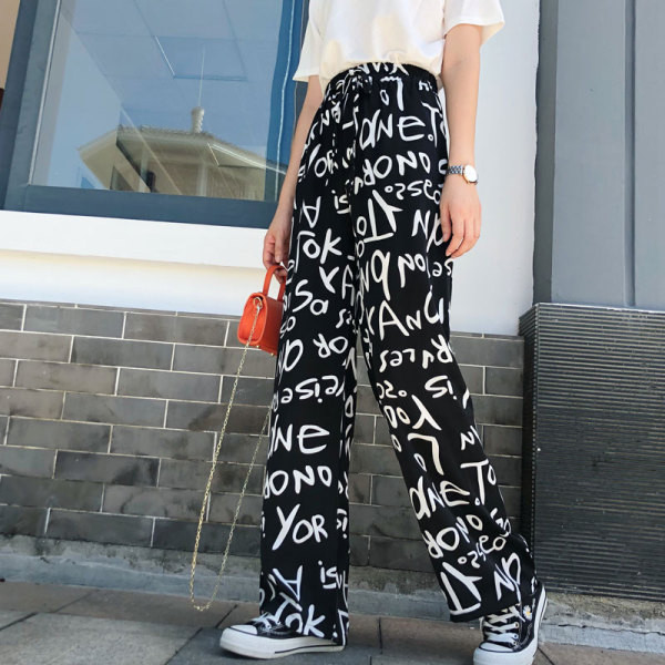 Női nadrág magas elasztikus derékkal és megkötővel