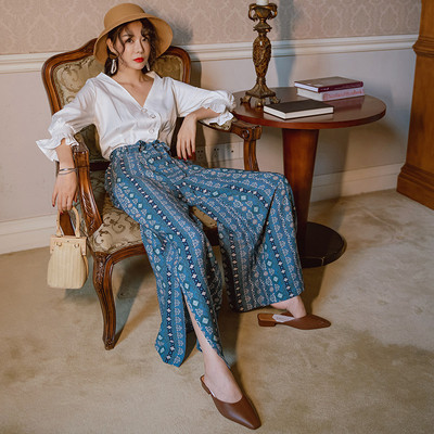 Naiste vabaajapüksid kõrge vöökoha ja sinise vööga