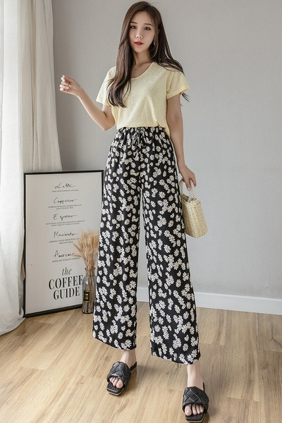 Naiste lillelised püksid kõrge vöökoha ja lipsudega