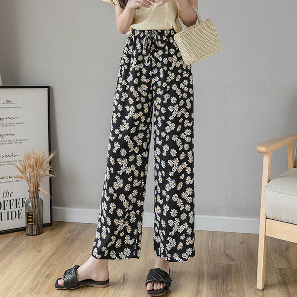 Naiste lillelised püksid kõrge vöökoha ja lipsudega