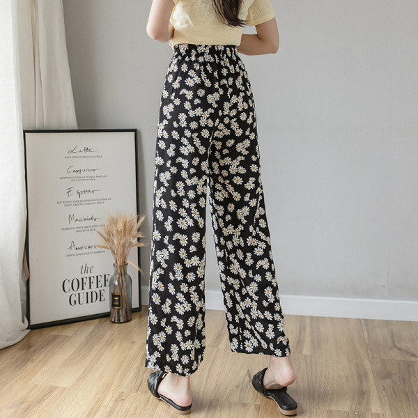 Naiste lillelised püksid kõrge vöökoha ja lipsudega