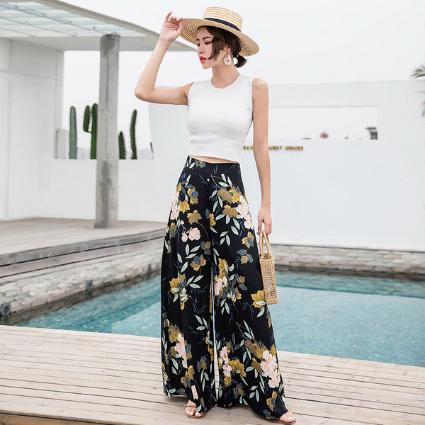 Moodsad lillelise mustriga musta värvi naiste püksid