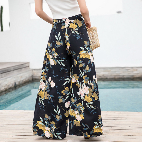 Moodsad lillelise mustriga musta värvi naiste püksid