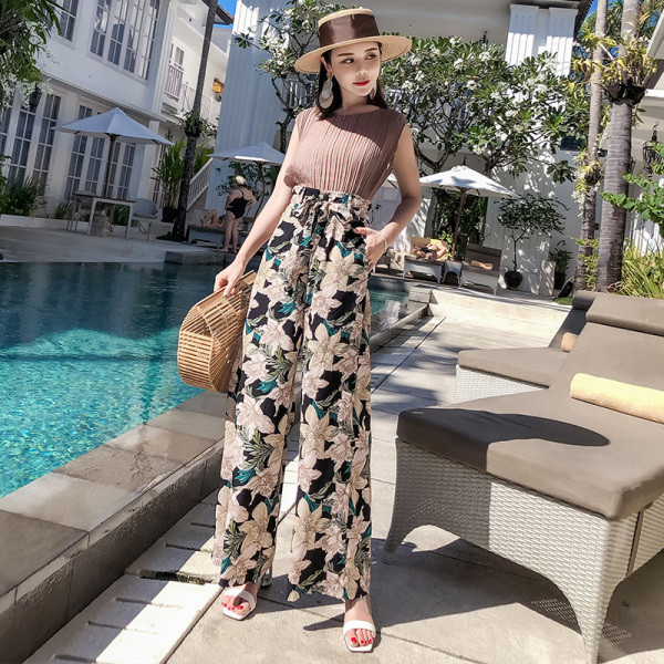 Női nadrág magas derékkal és nyakkendővel - széles modell