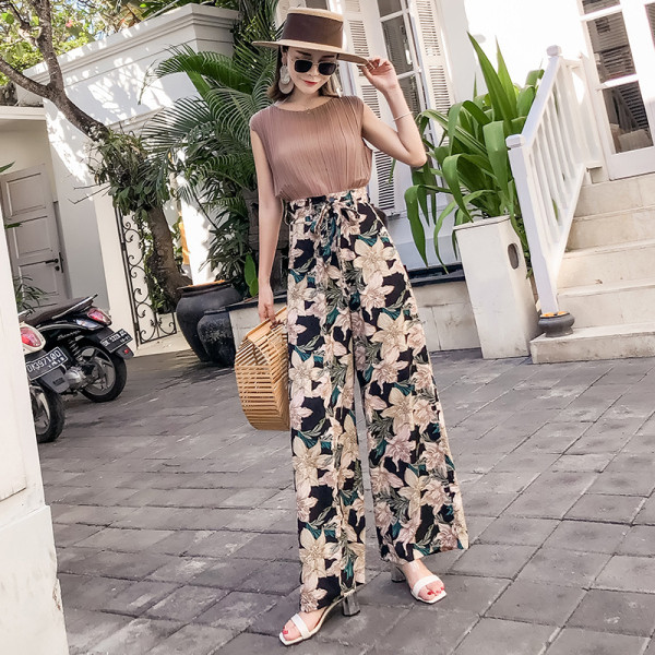 Női nadrág magas derékkal és nyakkendővel - széles modell