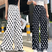 Valge ja musta värvi kõrge vöökohaga vabaaja naistepüksid