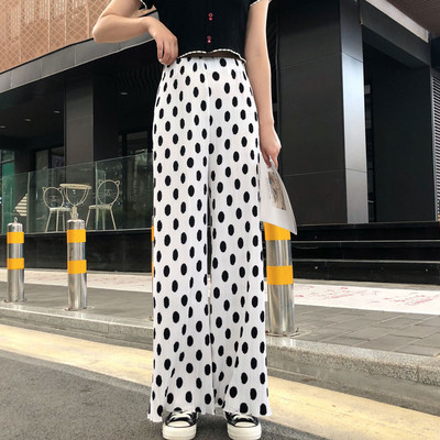 Valge ja musta värvi kõrge vöökohaga vabaaja naistepüksid