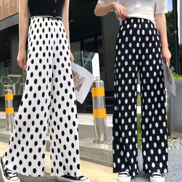 Valge ja musta värvi kõrge vöökohaga vabaaja naistepüksid