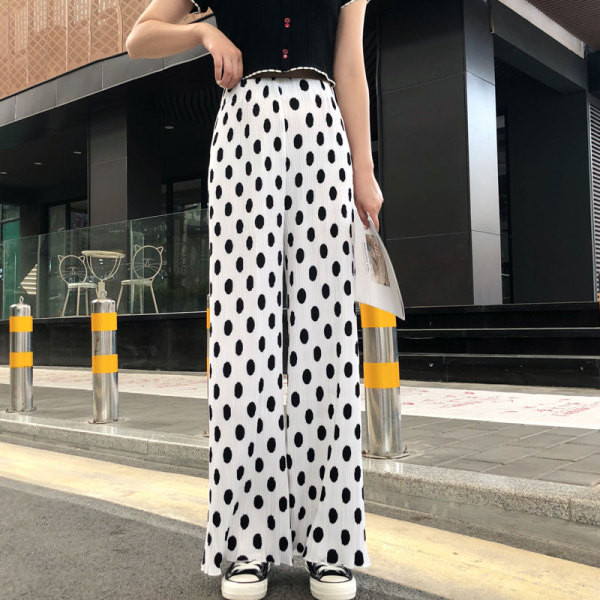 Valge ja musta värvi kõrge vöökohaga vabaaja naistepüksid