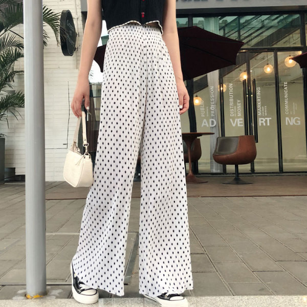 Valge ja musta värvi kõrge vöökohaga vabaaja naistepüksid