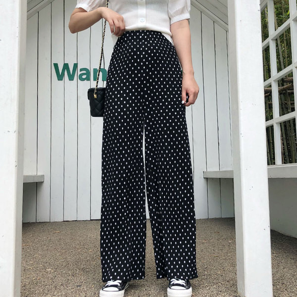 Valge ja musta värvi kõrge vöökohaga vabaaja naistepüksid