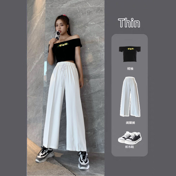 Moodsad naiste pikad laiad elastse vöökohaga püksid