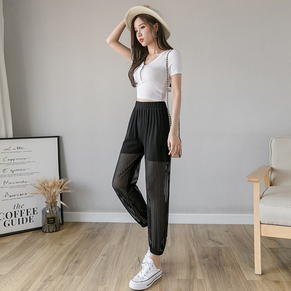 Női alkalmi nadrág magas derékkal, fekete színben