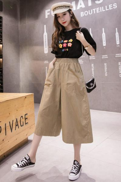 Női nadrág új modell magas derékkal és zsebekkel