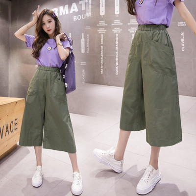 Női nadrág új modell magas derékkal és zsebekkel