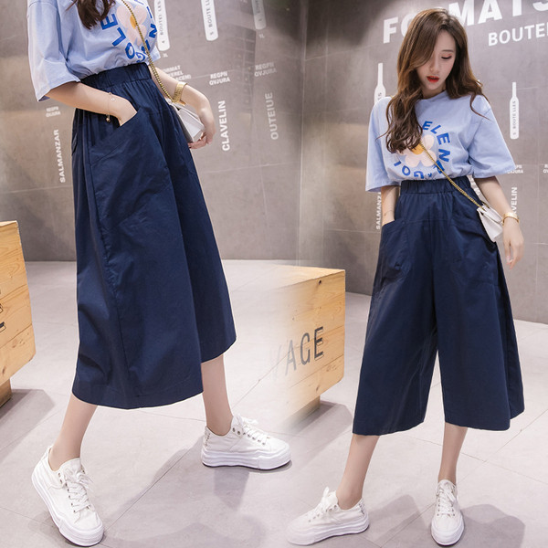 Női nadrág új modell magas derékkal és zsebekkel