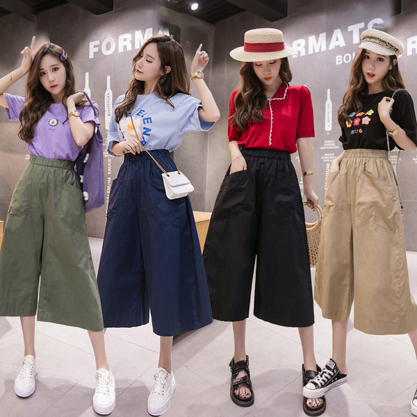 Női nadrág új modell magas derékkal és zsebekkel