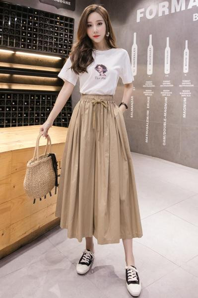 Női lezser széles nadrág elasztikus derékkal és megkötővel