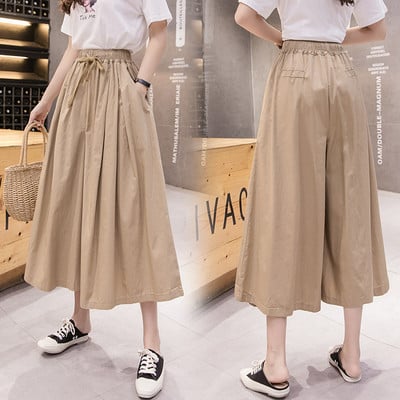 Női lezser széles nadrág elasztikus derékkal és megkötővel