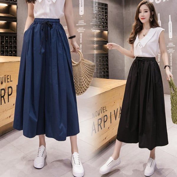 Női lezser széles nadrág elasztikus derékkal és megkötővel