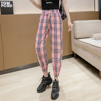 Modern női kockás nadrág magas derékkal és megkötővel