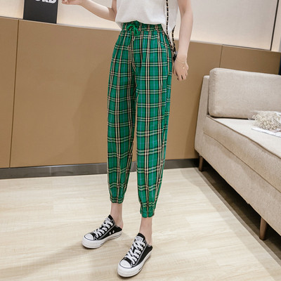 Modern női kockás nadrág magas derékkal és megkötővel