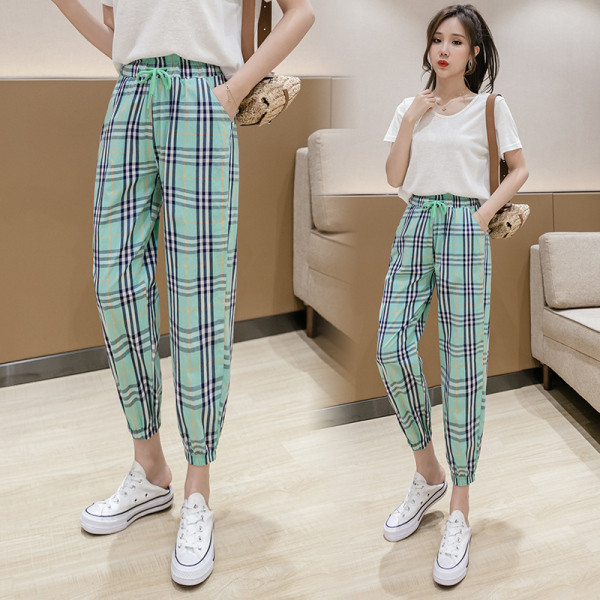 Modern női kockás nadrág magas derékkal és megkötővel