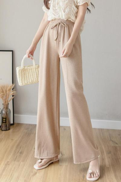 Divatos női nadrág nyakkendővel és elasztikus derékkal