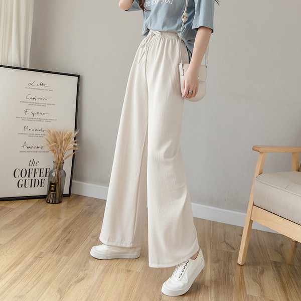 Divatos női nadrág nyakkendővel és elasztikus derékkal