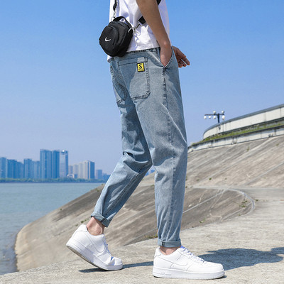 Alkalmi férfi hosszú farmernadrág zsebekkel és cipzárral