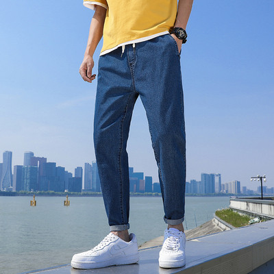 Alkalmi férfi hosszú farmernadrág zsebekkel és cipzárral