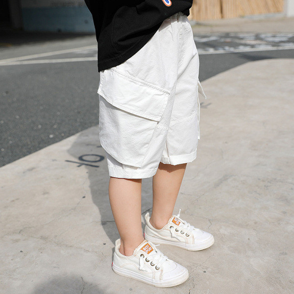 3/4 taskutega ja kummiga püksid