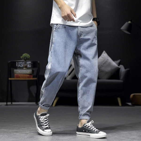 Mūsdienīgi vīriešu garie džinsi ar apmalēm un kabatām