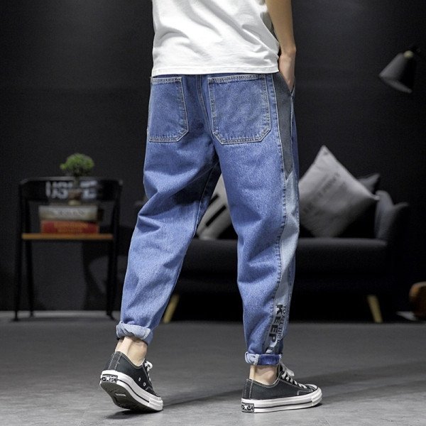 Mūsdienīgi vīriešu garie džinsi ar apmalēm un kabatām