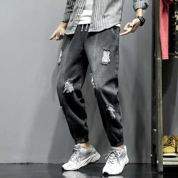 Ανδρικά τζιν με φαρδιά μοτίβα και τσέπες