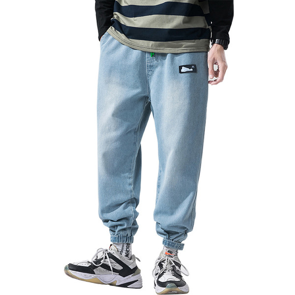 Ikdienas vīriešu garie džinsi ar kabatām un gumiju pie potītes