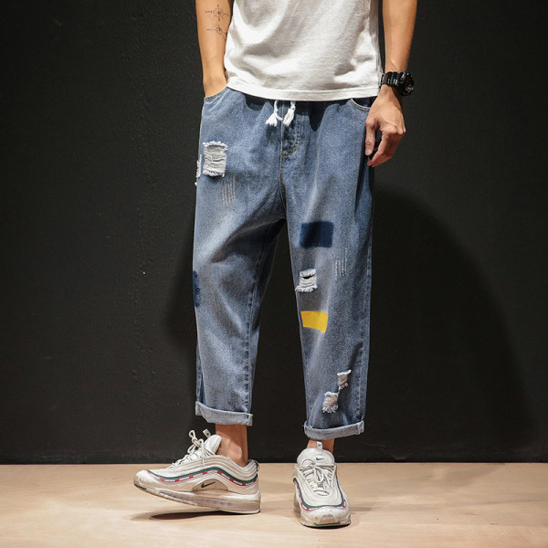 NOVI model muških dugih traperica široki model sa poderanim motivima