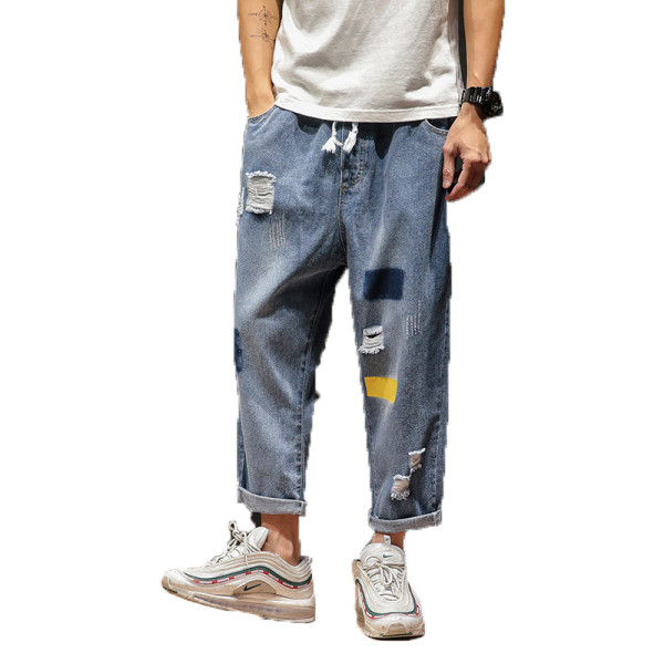 NOVI model muških dugih traperica široki model sa poderanim motivima