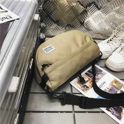 Igapäevane meeste embleemiga õlakott