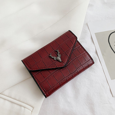 Eko-nahast naiste rahakott, millel on hirve kujuline metallkaunistus