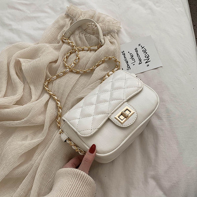 Stílusos női kistáska eco bőrből, hosszú füllel