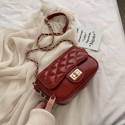 Stílusos női kistáska eco bőrből, hosszú füllel