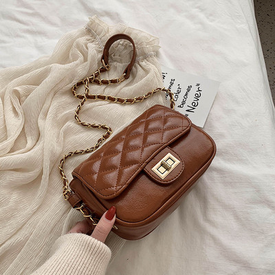 Stílusos női kistáska eco bőrből, hosszú füllel