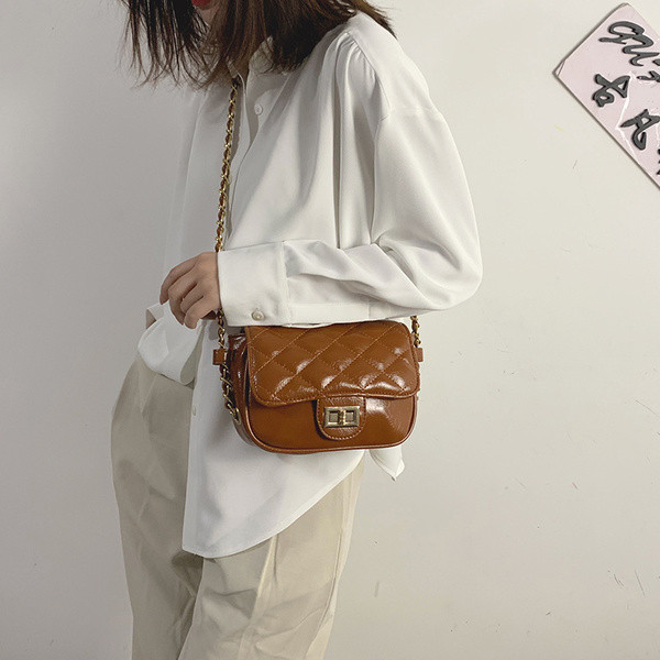 Stílusos női kistáska eco bőrből, hosszú füllel